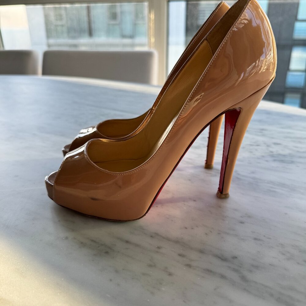 Louboutin Blush Peep Toe Pumps